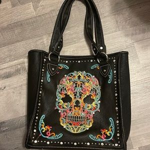 leather tote with skeleton head